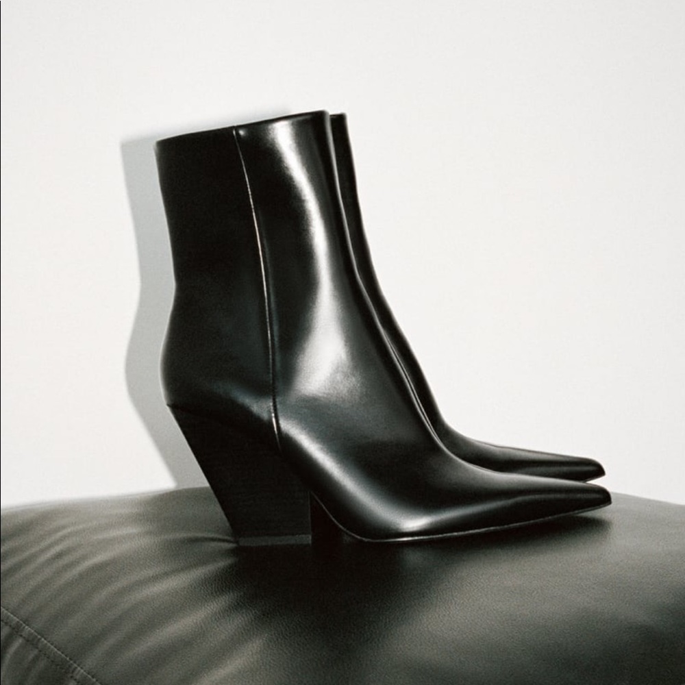 Black pointed toe heeled  boots